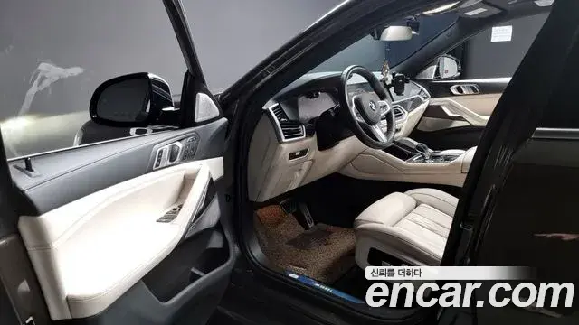 BMW X6 2021 — ფოტო 7/20