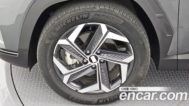 Hyundai Tucson Hybrid 2023 — ფოტო 7/20