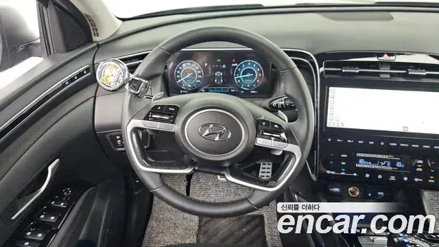 Hyundai Tucson Hybrid 2023 — ფოტო 15/20
