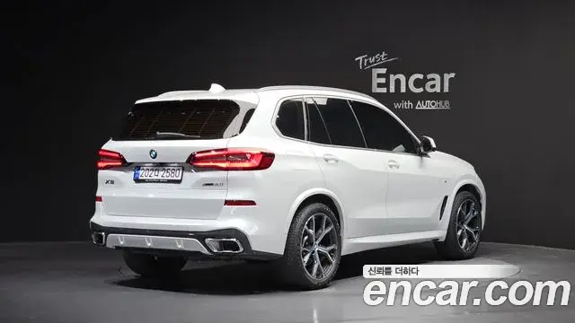 BMW X5 2023 — ფოტო 19/20