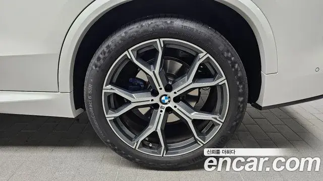 BMW X5 2023 — ფოტო 15/20