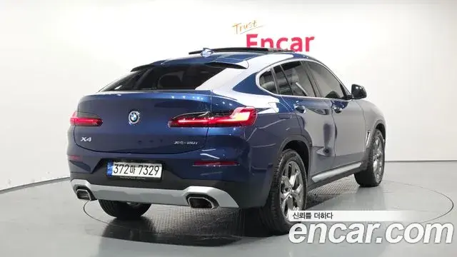 BMW X4 2022 — Фото 1/20