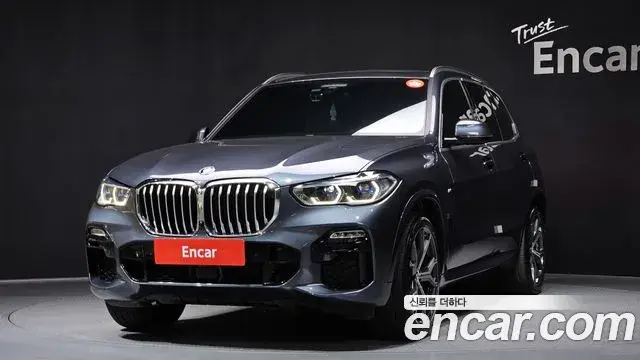 BMW X5 2021 — ფოტო 1/20