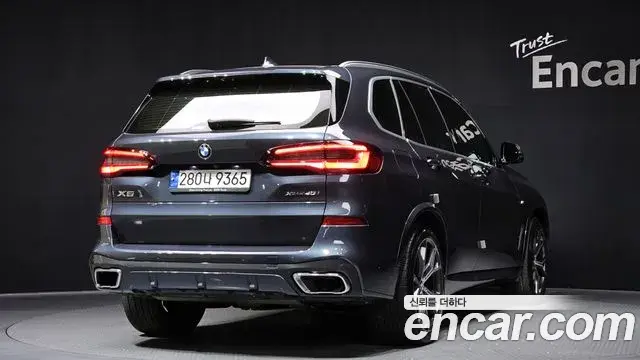 BMW X5 2021 — ფოტო 6/20
