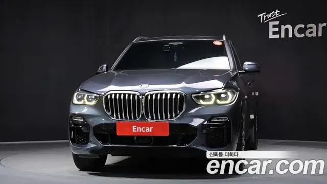 BMW X5 2021 — ფოტო 10/20