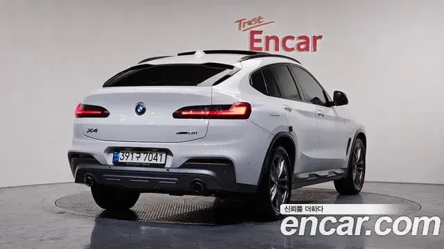 BMW X4 2021 — Фото 2/20