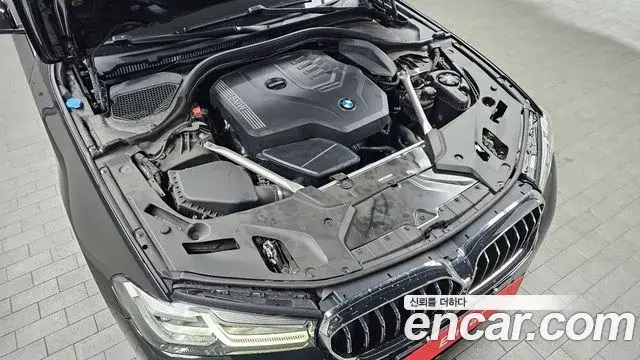 BMW 5 Series 2023 — ფოტო 10/20