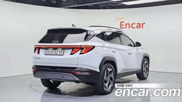 Hyundai Tucson Hybrid 2023 — ფოტო 11/20