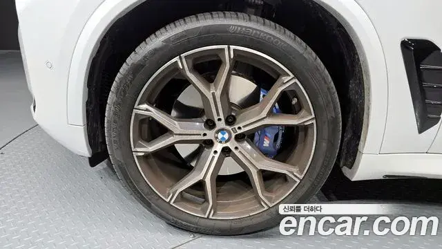 BMW X5 2024 — ფოტო 18/20