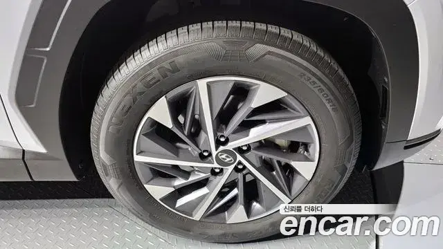 Hyundai Tucson Hybrid 2022 — ფოტო 8/20