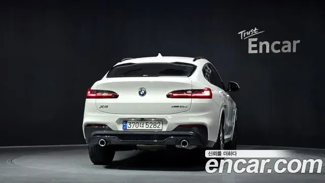BMW X4 2021 — ფოტო 14/20