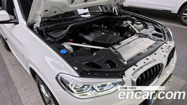 BMW X4 2021 — ფოტო 19/20