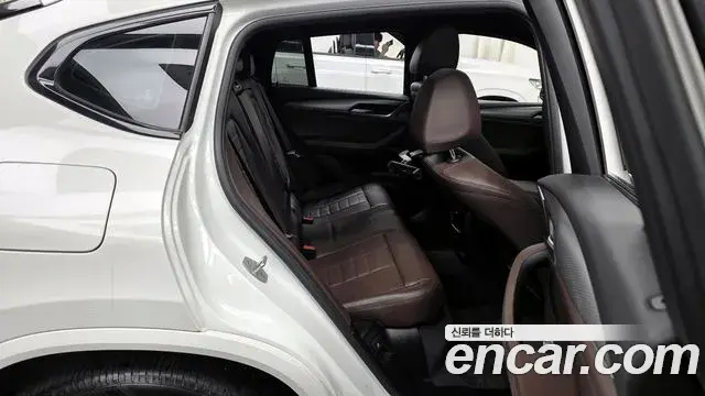 BMW X4 2021 — ფოტო 15/20