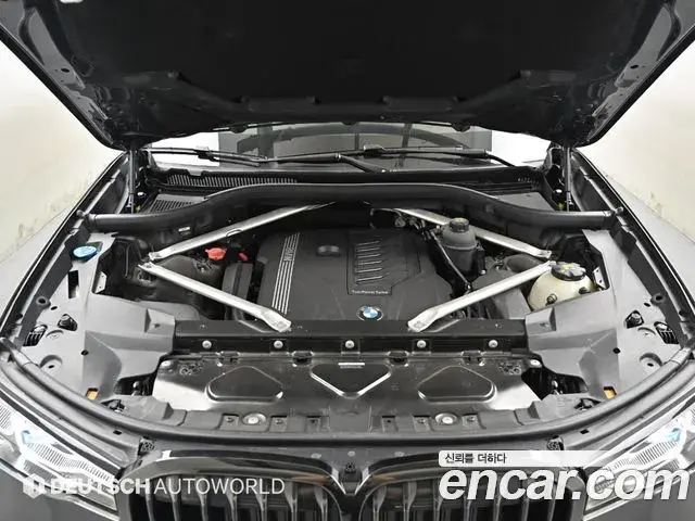 BMW X7 2022 — ფოტო 15/20