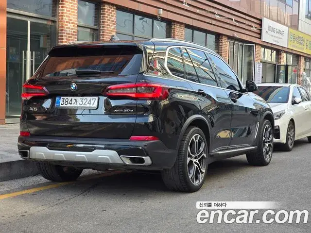 BMW X5 2022 — ფოტო 13/20