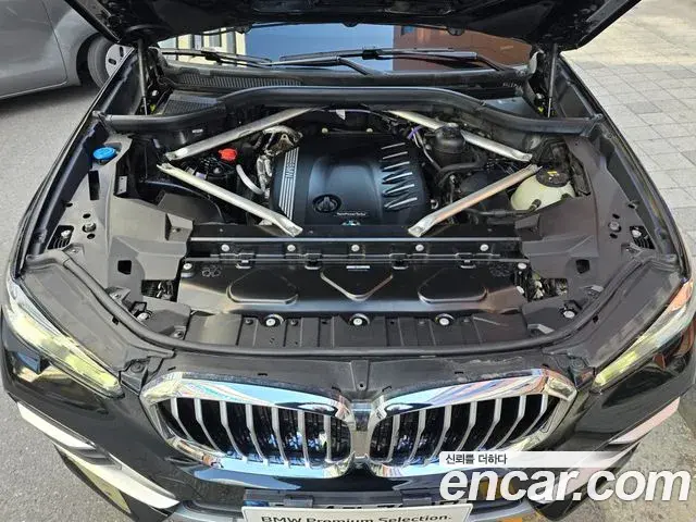 BMW X5 2022 — ფოტო 6/20