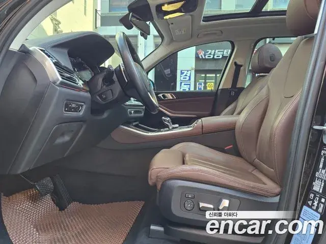 BMW X5 2022 — ფოტო 15/20