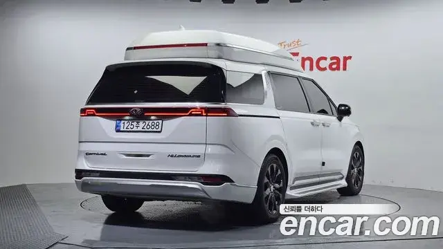Kia Carnival 2021 — ფოტო 8/20