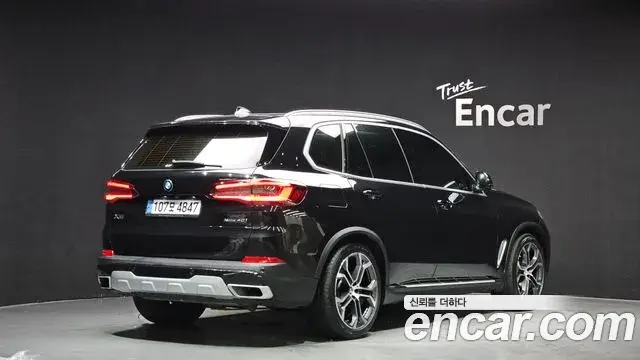 BMW X5 2022 — ფოტო 4/20