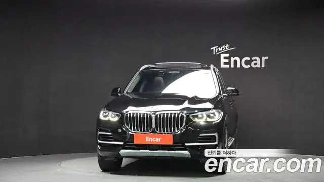BMW X5 2022 — ფოტო 8/20