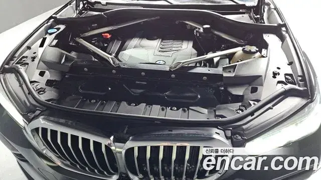 BMW X5 2022 — ფოტო 6/20