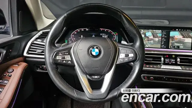 BMW X5 2022 — ფოტო 7/20