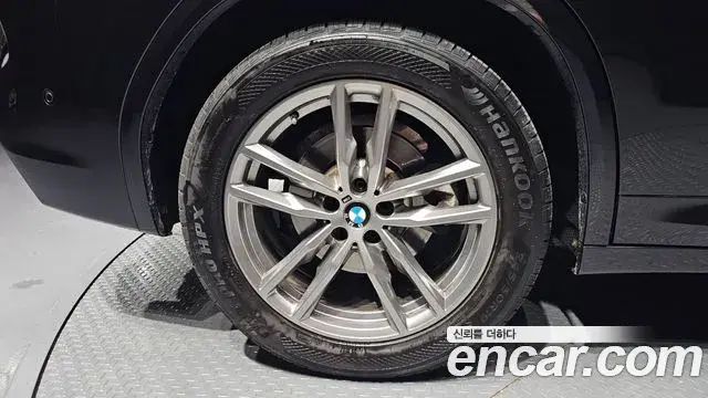 BMW X3 2021 — ფოტო 11/36