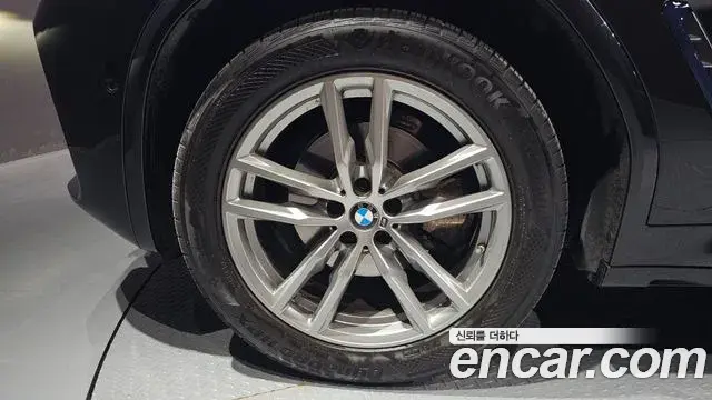 BMW X3 2021 — ფოტო 26/36