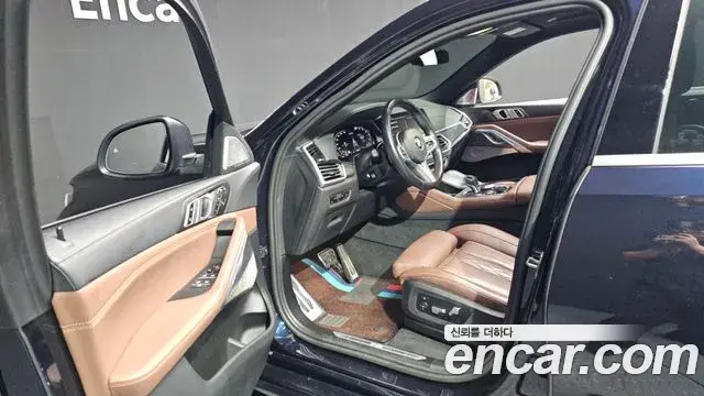 BMW X6 2023 — ფოტო 33/36
