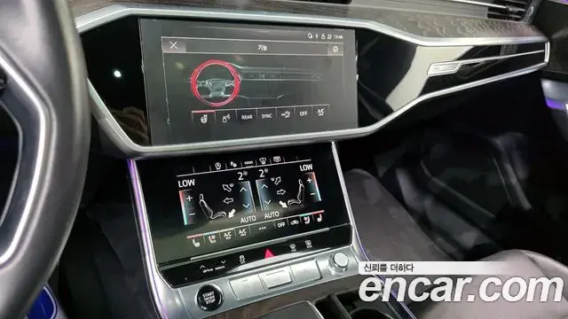 Audi A6 2021 — ფოტო 27/33