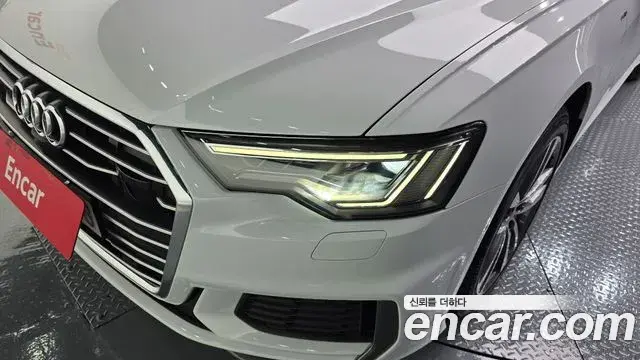 Audi A6 2021 — ფოტო 29/33