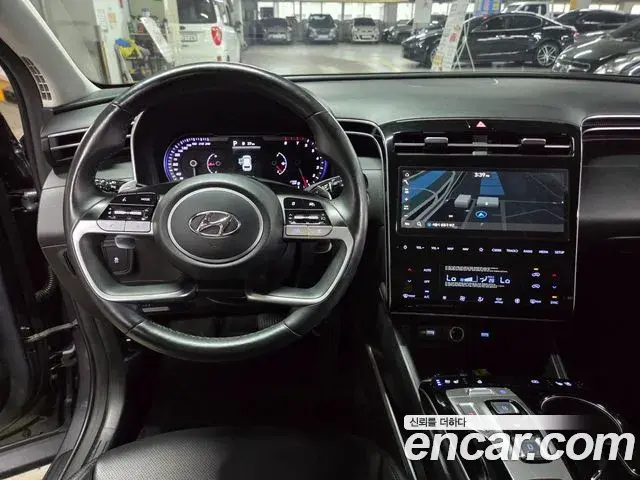 Hyundai Tucson Hybrid 2022 — ფოტო 8/20