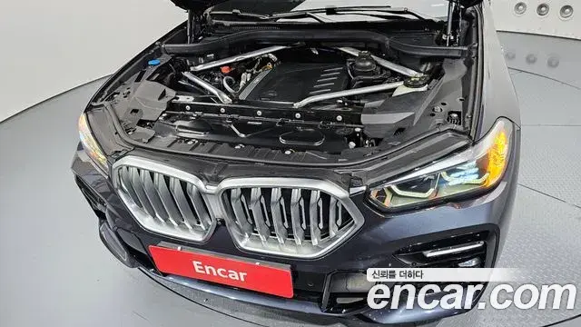 BMW X6 2021 — ფოტო 26/33