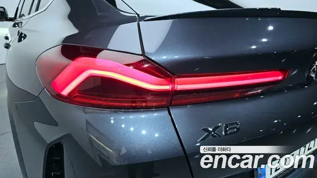 BMW X6 2021 — ფოტო 24/33