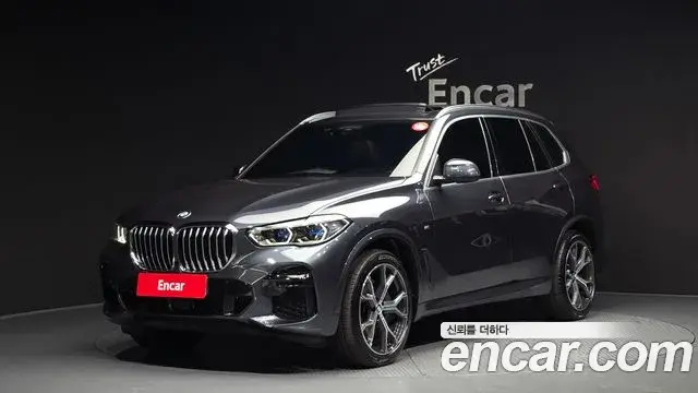 BMW X5 2022 — Фото 1/20