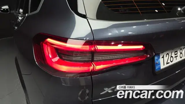 BMW X5 2022 — ფოტო 13/32