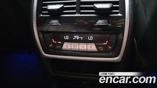 BMW X5 2022 — ფოტო 27/32
