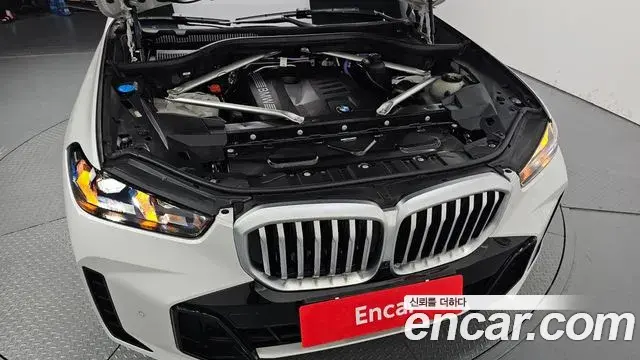 BMW X5 2025 — ფოტო 23/35