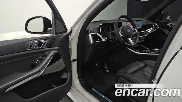 BMW X5 2025 — ფოტო 30/35