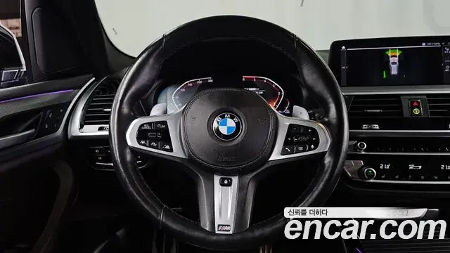 BMW X3 2021 — ფოტო 24/31