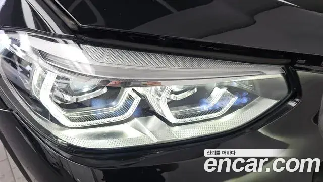 BMW X3 2021 — ფოტო 27/31