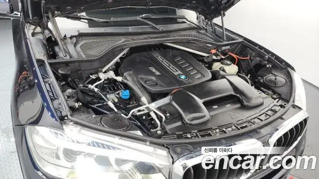 BMW X5 2018 — ფოტო 13/20