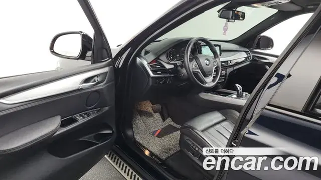 BMW X5 2018 — ფოტო 9/20