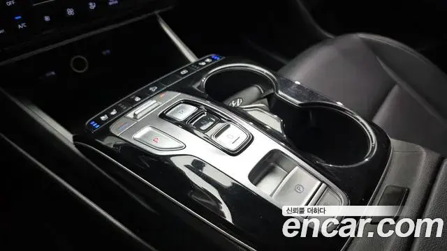 Hyundai Tucson Hybrid 2021 — ფოტო 11/20