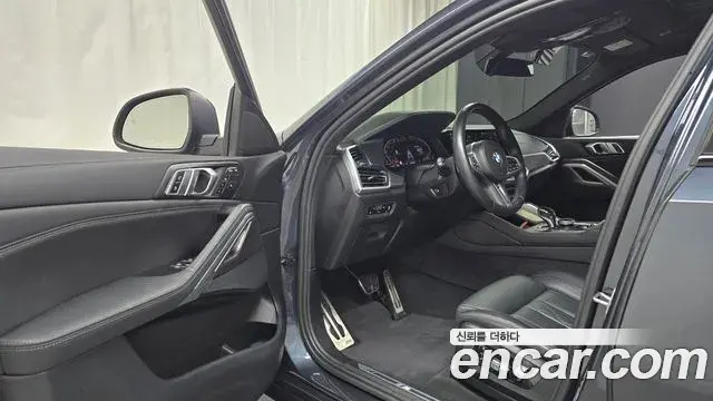 BMW X6 2022 — ფოტო 8/31