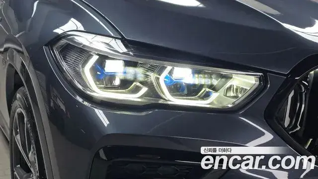 BMW X6 2022 — ფოტო 23/31
