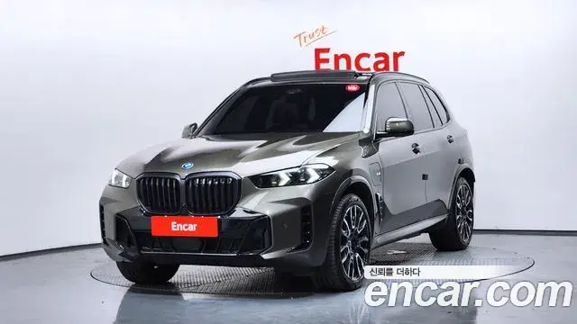 BMW X5 2024 — Фото 1/20