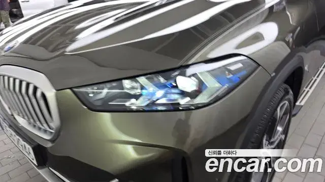 BMW X5 2025 — ფოტო 32/32