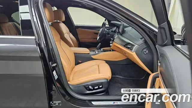 BMW 5 Series 2023 — Şəkil 25/31