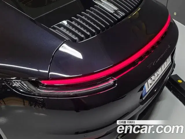 Porsche 911 2023 — ფოტო 15/20